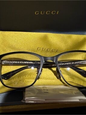 Gucci Black Frames with Gold Logo Detailing